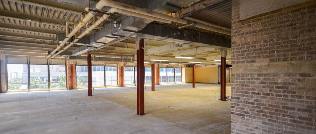 Office remodel. Stripped down to metal supports and concrete floor. Space is ready for finishes and remodeling.